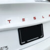 Tesla Performance Emblem Red